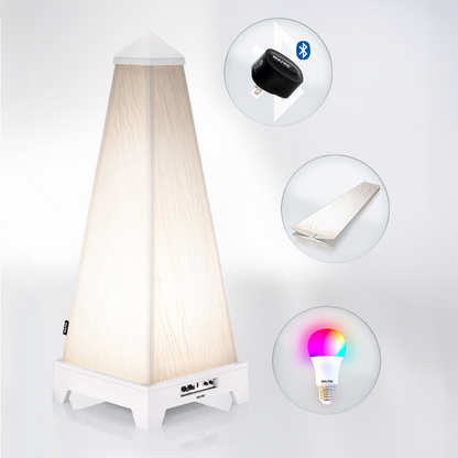 XOUNTS Starterkit with white base, showcasing the included accessories: Pure Glow Style cover for a sleek, modern look, energy-efficient LED bulb for ambient lighting, and the Bluetooth module for wireless music streaming. This all-in-one sound and lighting system is perfect for enhancing any room with both high-quality sound and customizable lighting options.