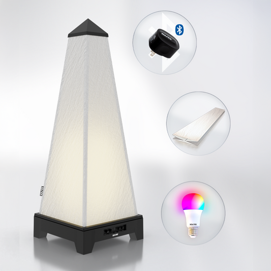 XOUNTS Starterkit with black base, showcasing the included accessories: Pure Glow Style cover for a sleek, modern look, energy-efficient LED bulb for ambient lighting, and the Bluetooth module for wireless music streaming. This all-in-one sound and lighting system is perfect for enhancing any room with both high-quality sound and customizable lighting options.